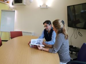 Two people in the meeting room at Chilgrove Business Centre