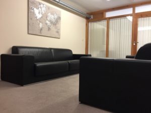 Photo showing sofas outside meeting room